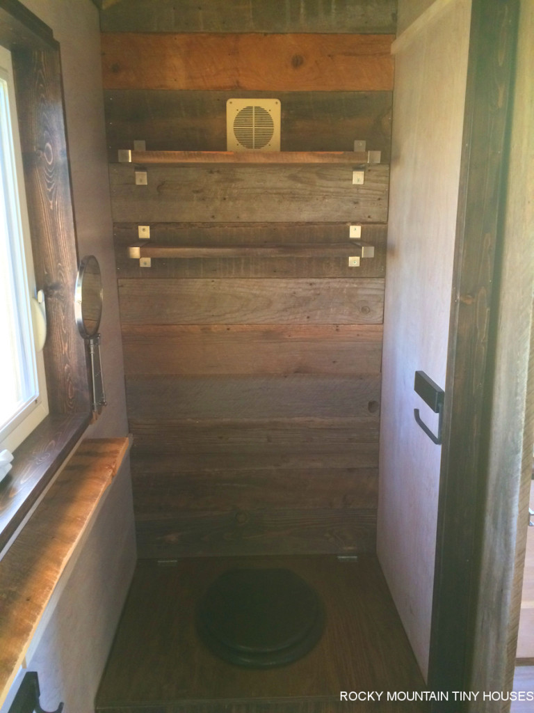 curved roof tiny house bathroom