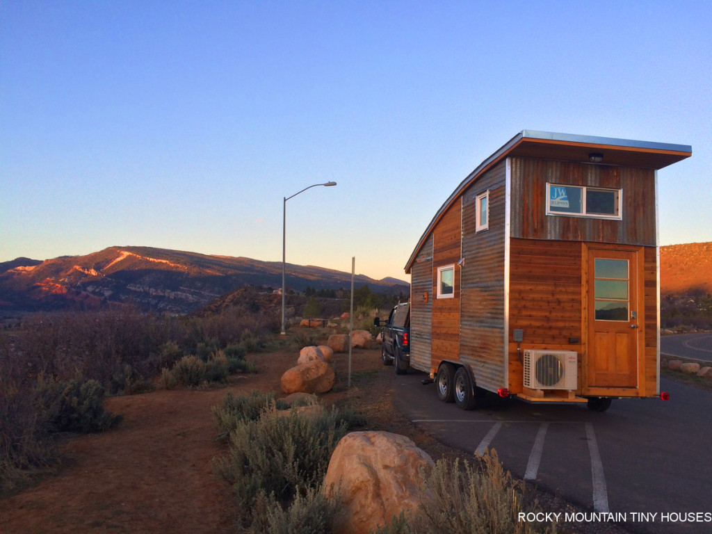 curved roof tiny house sunset