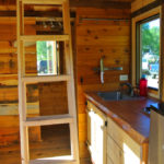 log cabin tiny house kitchen